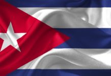 Raul Castro Warily Celebrates Anniversary of Cuban Revolution Cuba Flag