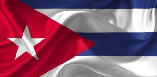 Raul Castro Warily Celebrates Anniversary of Cuban Revolution Cuba Flag