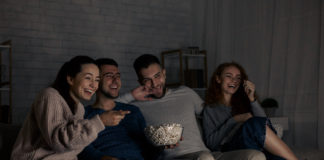 Netflix Versus Latinos: Yes, We Are Still Talking About ODAAT What Gives? Latino Family Watching Movie Netflix BeLatina