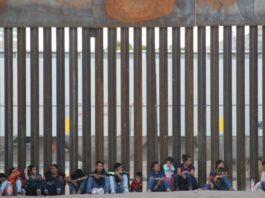 Central American Migrants Cross The Rio Bravo To Surrender To Border Patrol