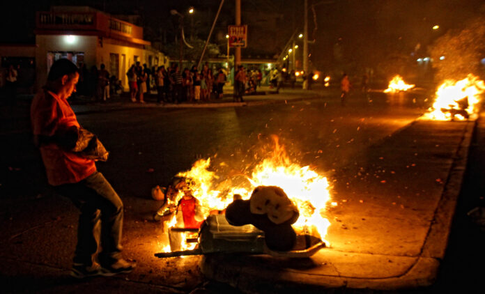 From Burning Dolls to Eating Grapes, Here are Some of the New Year’s Eve Rituals Across Latin America