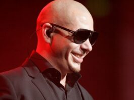 Pitbull Invites Fans to Break Guinness Record With Iconic Bald Look in London Pitbull Invites Fans to Break Guinness Record With Iconic Bald Look in London