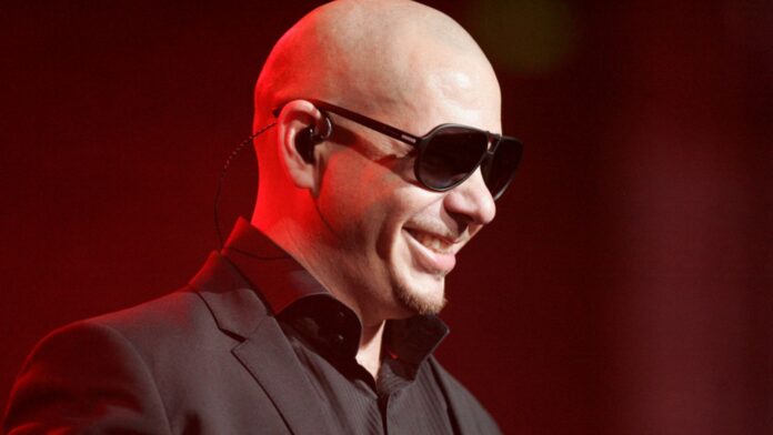 Pitbull Invites Fans to Break Guinness Record With Iconic Bald Look in London